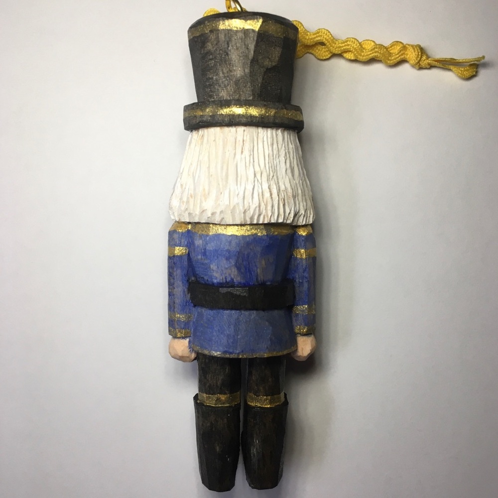 Hand Carved Blue and Gold Nutcracker Ornament - Picture 2 of 3